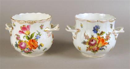 Appraisal: Pair of Dresden porcelain cache pots th century Decorated with