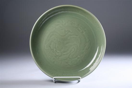 Appraisal: CHINESE CELADON GLAZED PORCELAIN SHALLOW BOWL Ming Dynasty Incised with