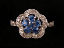 Appraisal: Ladies Sapphire Diamond Flower Ring Ladies genuine sapphire and diamond