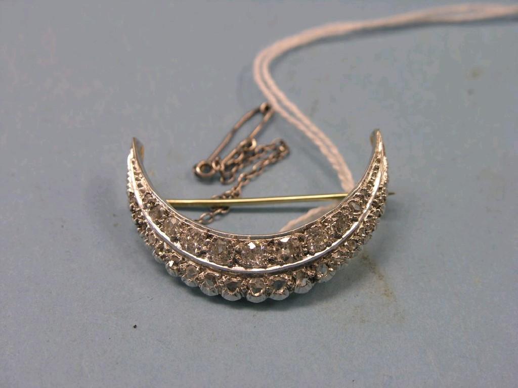 Appraisal: A Victorian Edwardian diamond crescent brooch graduated arrangement in two