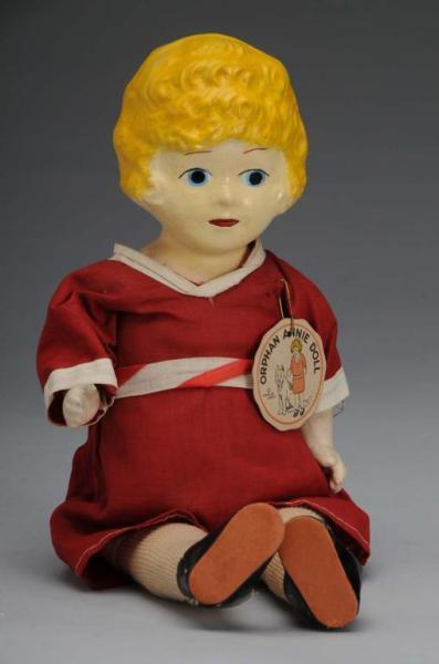 Appraisal: Composition Orphan Annie Character Doll Description Cloth-covered body with original