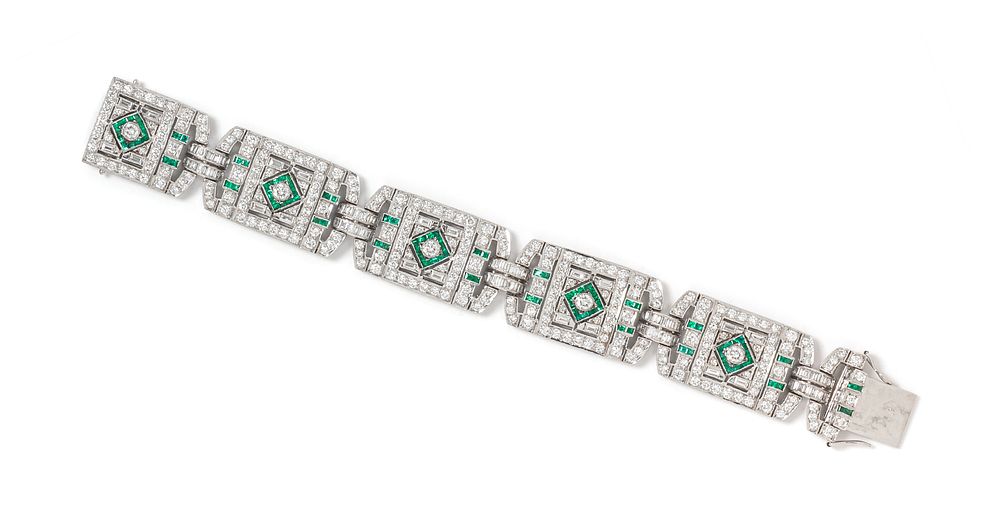 Appraisal: DIAMOND AND EMERALD BRACELET DIAMOND AND EMERALD BRACELET Containing numerous