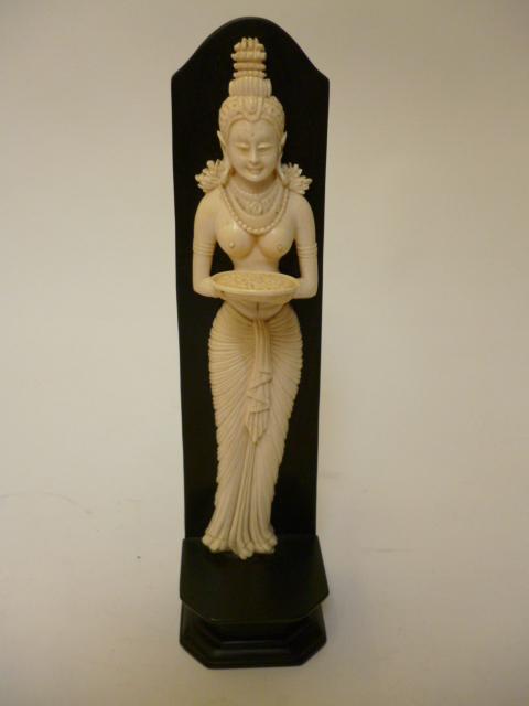 Appraisal: AN INDIAN IVORY FLATBACK FIGURE c carved as a semi