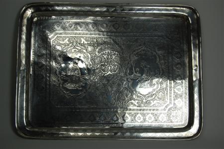 Appraisal: A large rectangular Indian tray with detailed engraved borders and