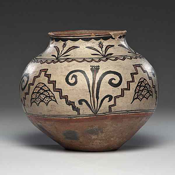 Appraisal: San Ildefonso Polychrome Olla concave base with globular body florals