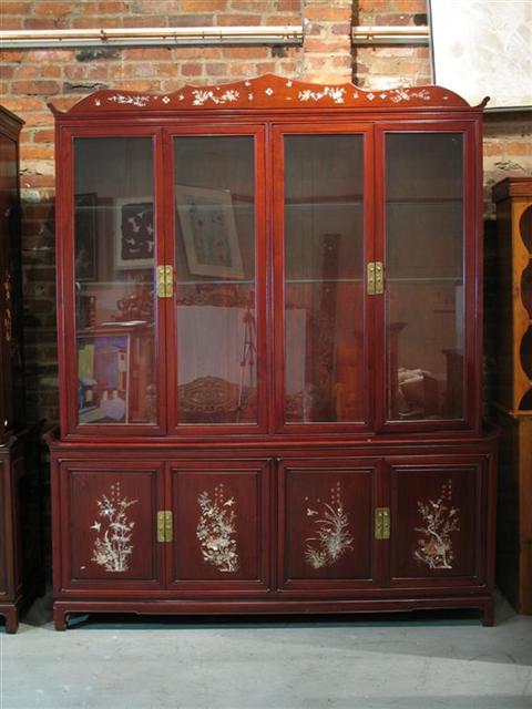 Appraisal: CHINESE MOTHER OF PEARL ROSEWOOD CABINET Twentieth century the shaped