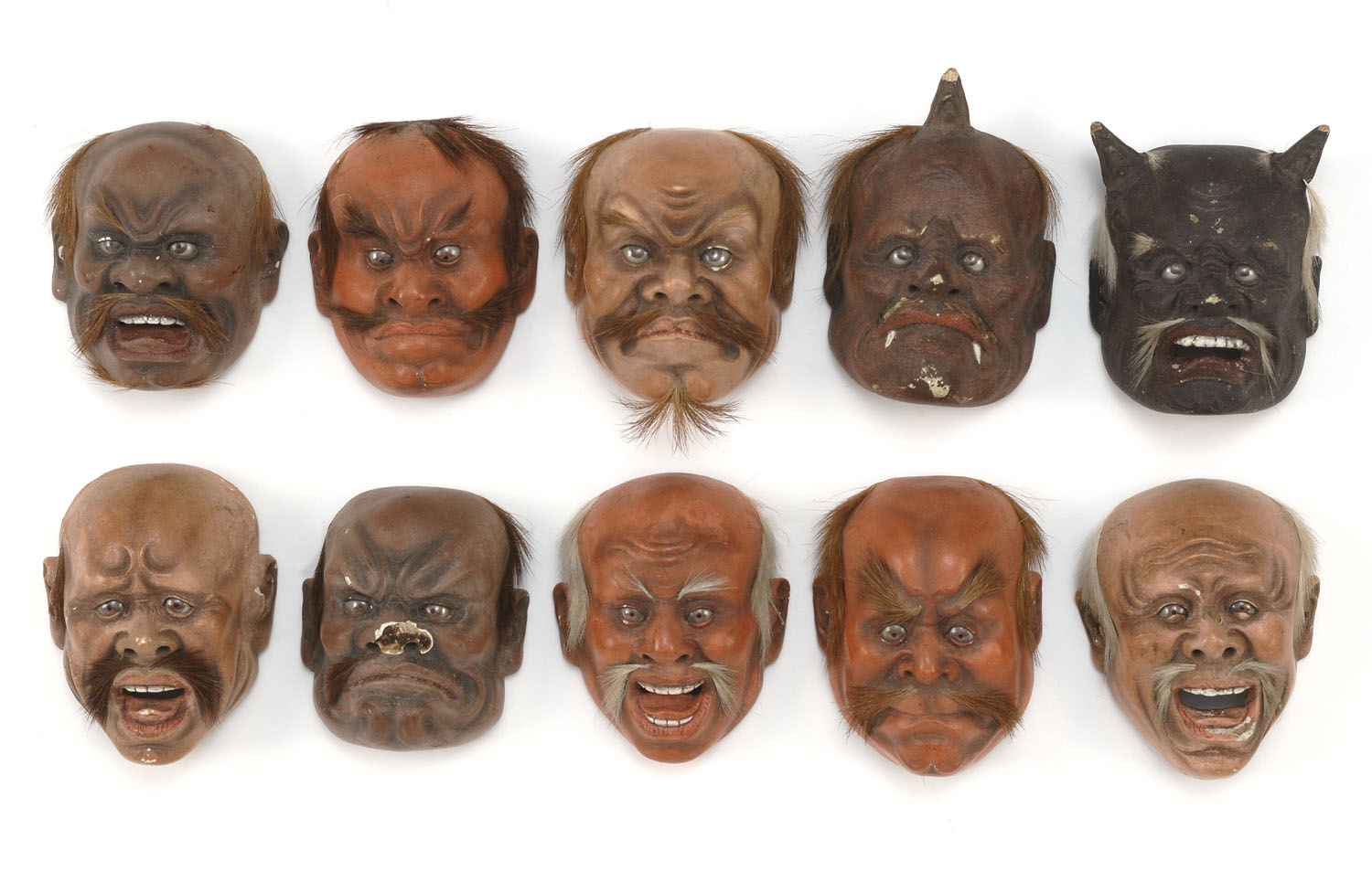 Appraisal: SET OF TEN LACQUER-ON-WOOD MINIATURE MASKS th CenturyDepicting various theatrical