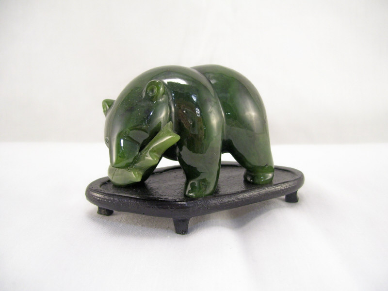 Appraisal: Carved Green Jade Bear on Stand Carved jade figure of