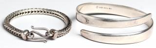 Appraisal: Pair Silver Bracelets Metropolitan Museum of Art The first a