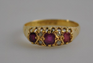 Appraisal: Ruby and rose diamond seven stone ring ct claw setting