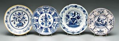 Appraisal: Four Delft shallow bowls one with central medallion with dog