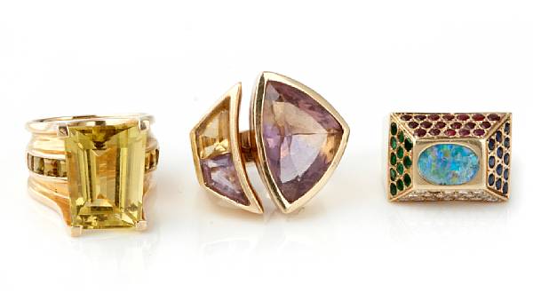 Appraisal: A collection of three gem-set and k gold rings with