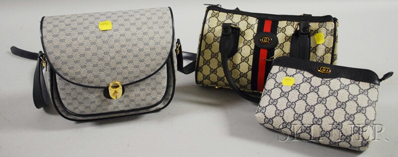 Appraisal: Three Coated Canvas Gucci Purses with leather trim and straps