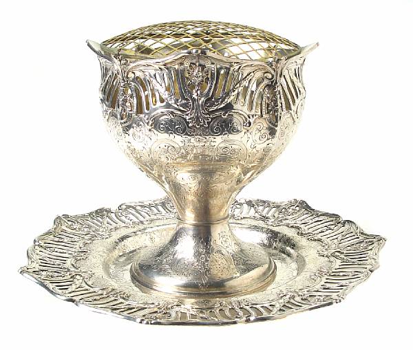 Appraisal: A sterling centerpiece with under tray and plated reticulated cover