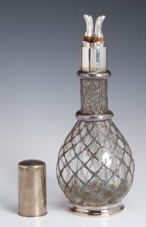 Appraisal: An early th century baluster form four-chamber bottle with silver