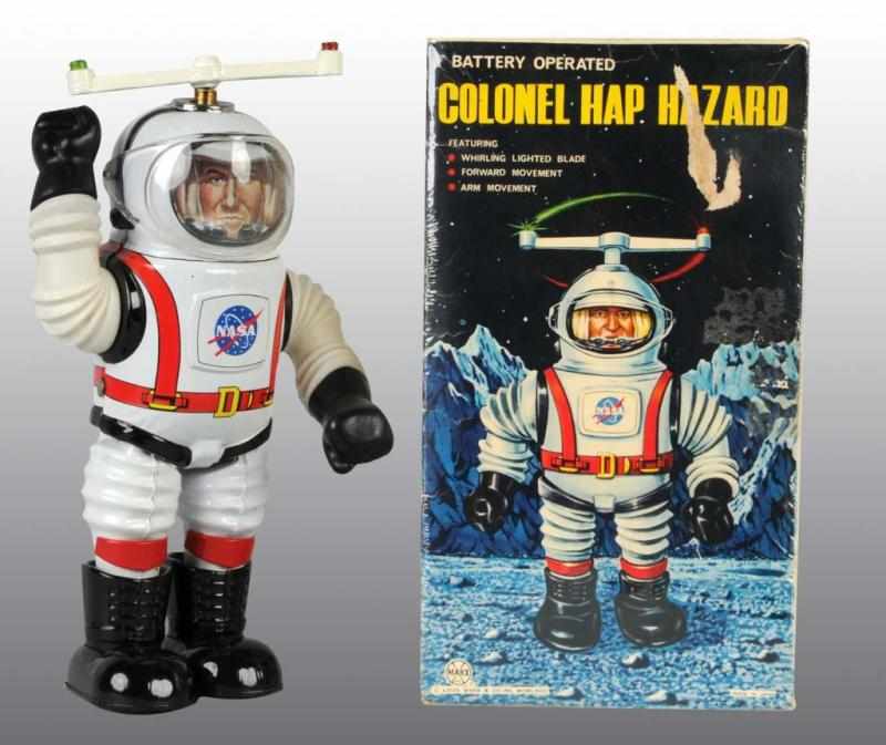 Appraisal: Tin Colonel Hap Hazard Astronaut Battery-Op Toy Description Japanese Working