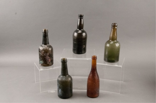 Appraisal: Assortment of Five Brown Glass Bottles Including Johann Hoff BFB