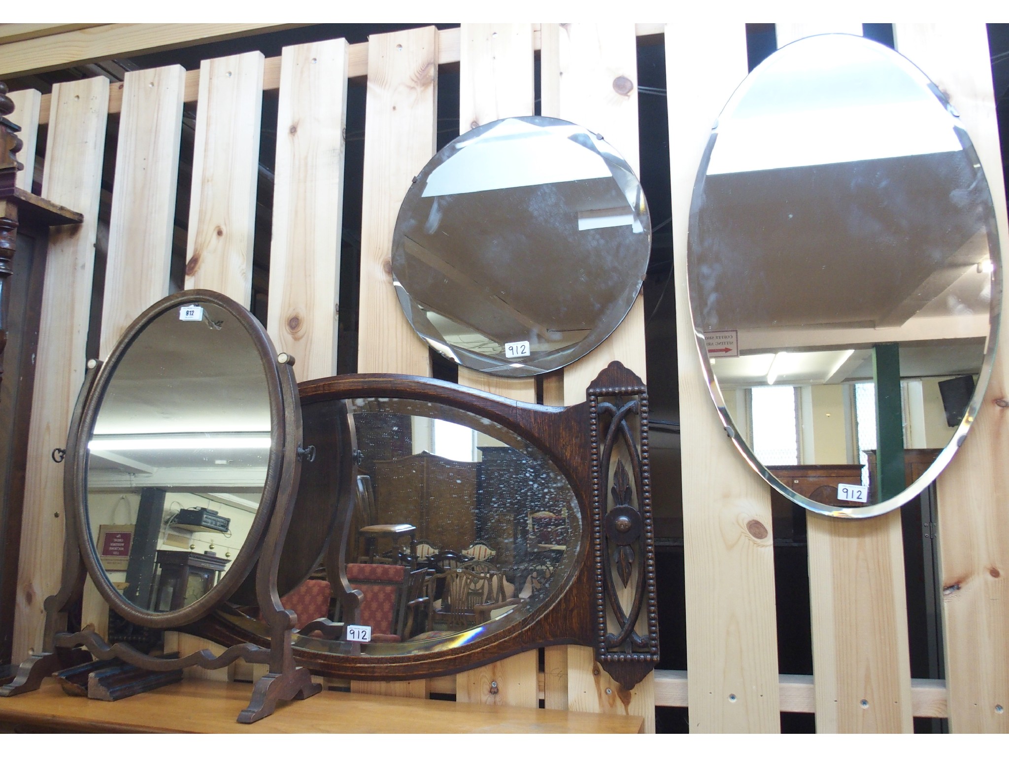 Appraisal: An oak wall mirror mirror on stand and two wall