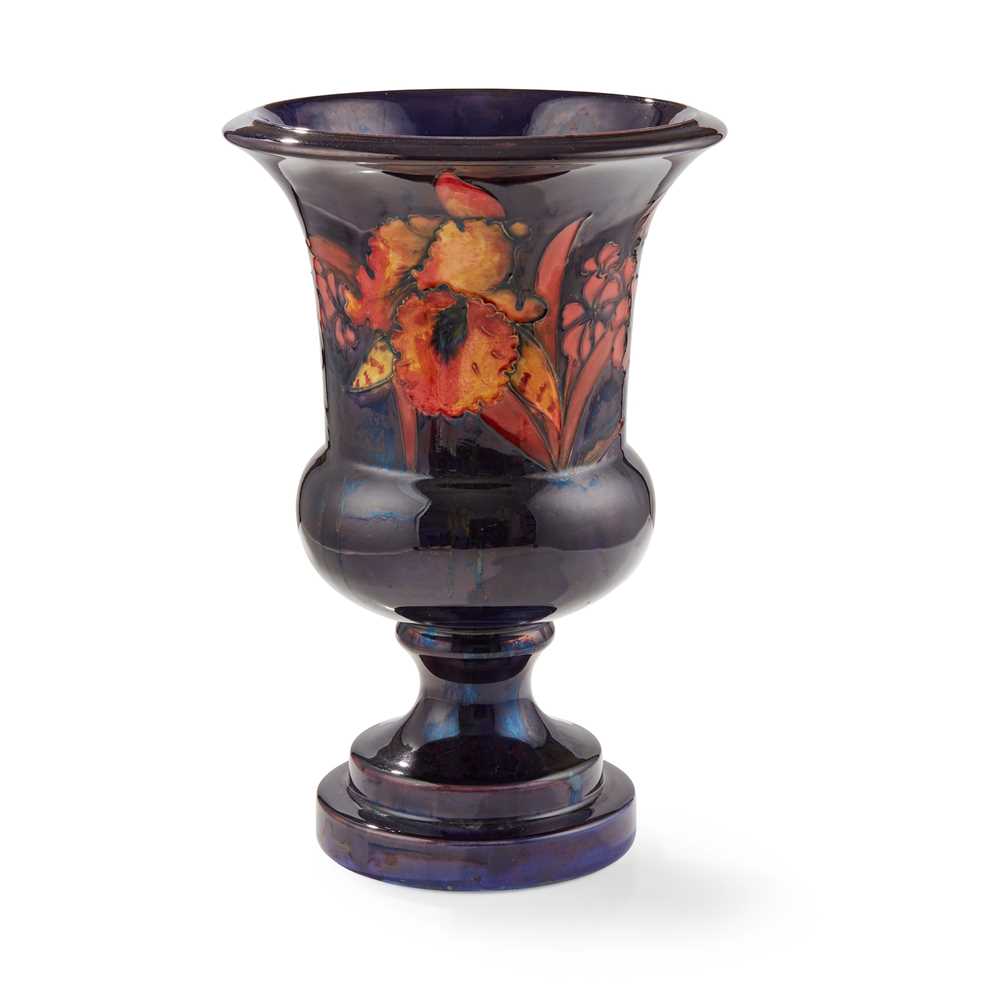 Appraisal: WILLIAM MOORCROFT - FOR MOORCROFT POTTERY FLAMB ORCHID PATTERN URN-SHAPED