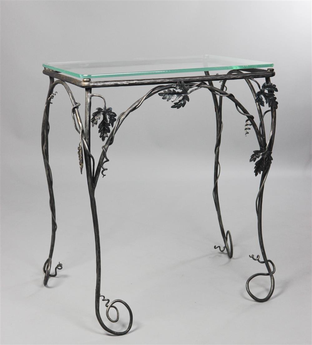 Appraisal: ROCOCO STYLE WROUGHT IRON GLASS TOP SIDE TABLE the rectangular