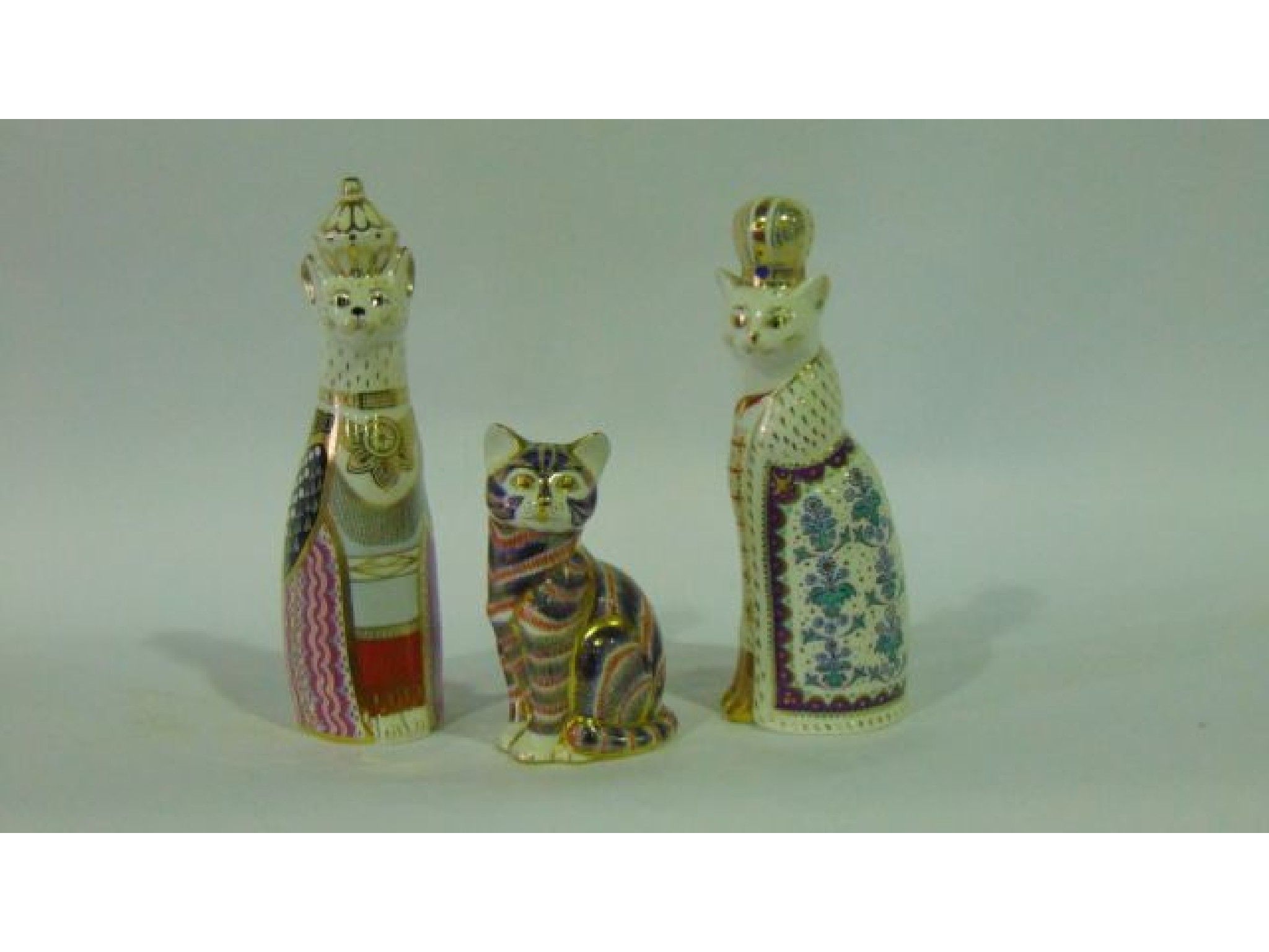 Appraisal: A pair of Royal Crown Derby models of cats from