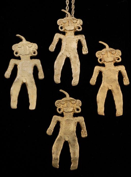 Appraisal: FOUR PRE-COLUMBIAN STYLE PENDANTS stamped k stamped Provenance Property from