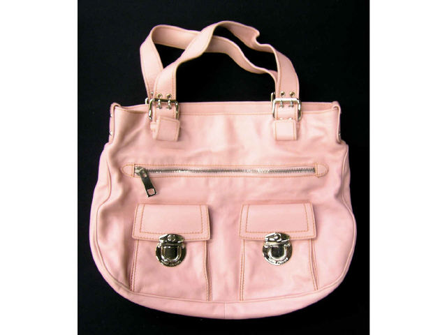 Appraisal: Pink leather Marc Jacobs handbag with two snap pockets zipper