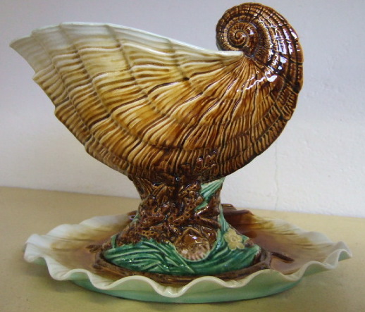 Appraisal: A Choisy le roi majolica nautilus shell bowl and matching