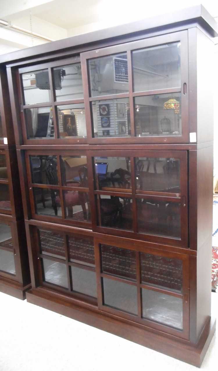 Appraisal: CONTEMPORARY THREE SECTION CABINET BOOKCASE each of three horizontal sections