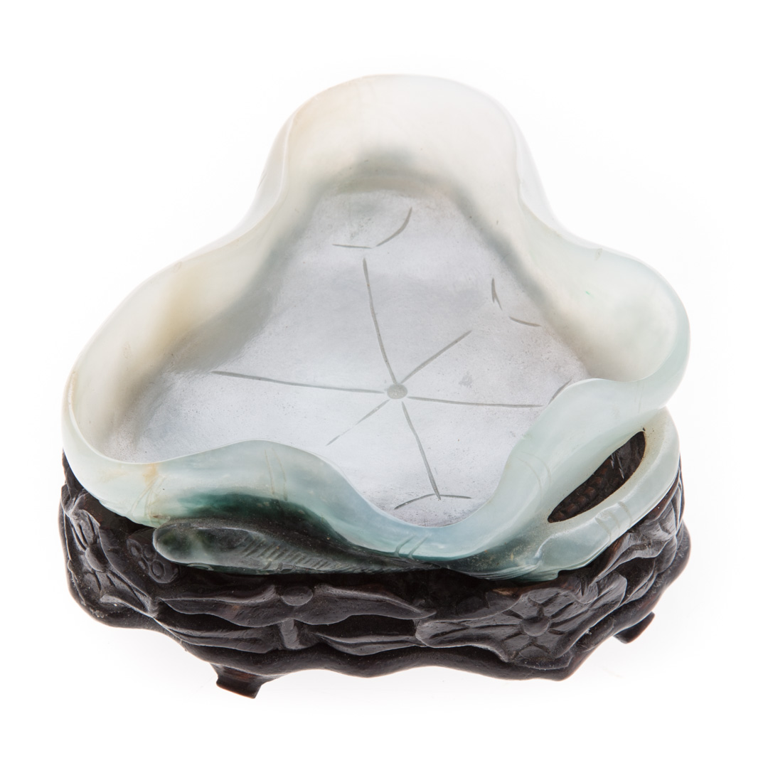 Appraisal: Chinese carved jade lotus leaf water dipper with carved and