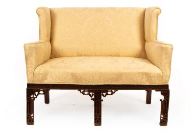 Appraisal: A two-seater sofa of Chinese Chippendale design with blind fret