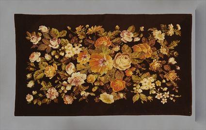 Appraisal: FLORAL NEEDLEWORK RUG Worked with a rich display of summer