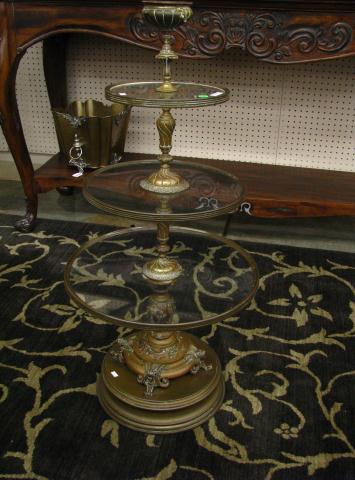 Appraisal: Three-tiered bronze tea table '' high with three glass tiers