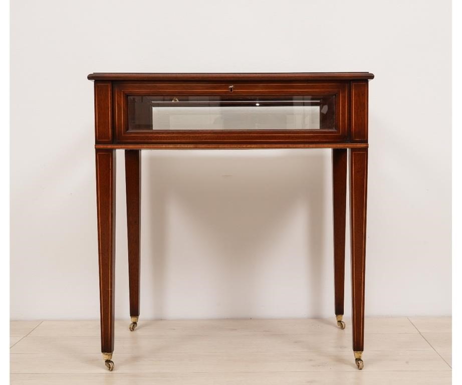 Appraisal: Hepplewhite style mahogany inliad curio cabinet with beveled glass and