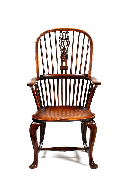 Appraisal: A GEORGE III ASH AND ELM THAMES VALLEY WINDSOR ARMCHAIR