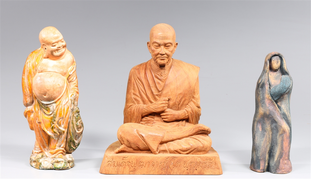 Appraisal: Group of three vintage statues including carved wood Tibeten monk