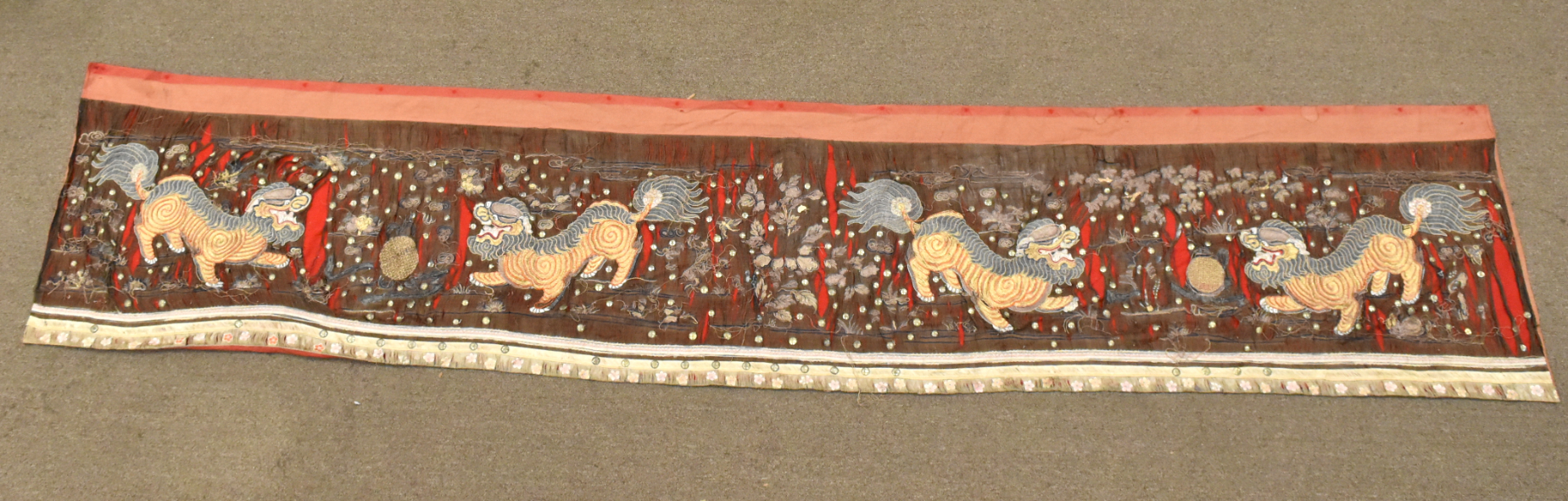 Appraisal: This long Chinese silk embroidery features four fu dogs two