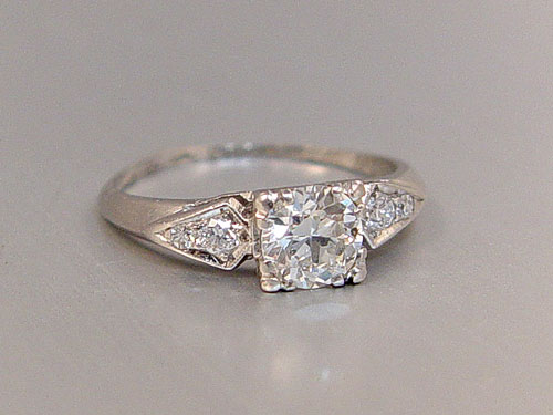 Appraisal: PLATINUM AND DIAMOND RING CA - Platinum ring centers one