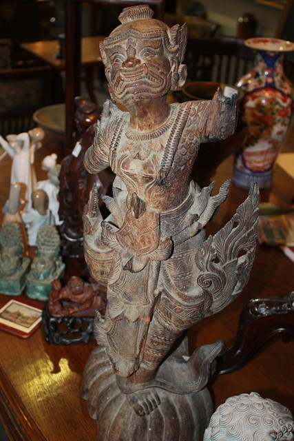 Appraisal: A CARVED LARGE BURMESE DANCING GIRL cm