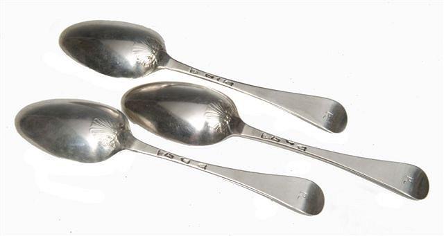 Appraisal: THREE GEORGE II SILVER SHELL BACKED RAT-TAIL PATTERN TABLESPOONS -