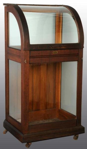 Appraisal: Curved Glass Country Store Case Description Oak Has original shelf