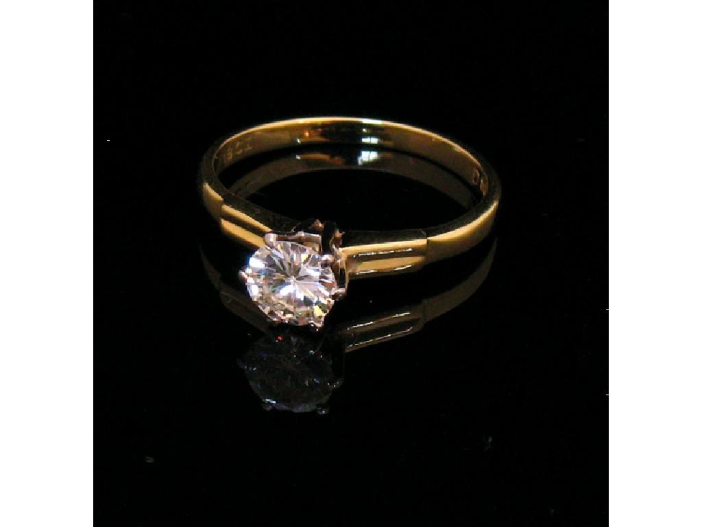 Appraisal: A DIAMOND SOLITAIRE RING the central round-cut diamond c cts