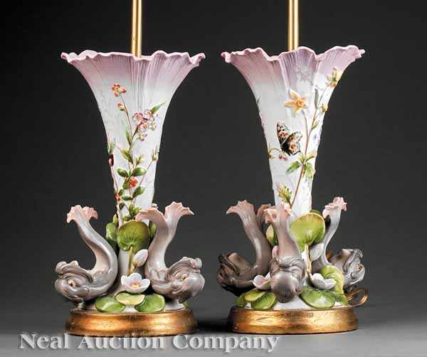 Appraisal: A Pair of Meissen Porcelain Figural Vases flared lip applied