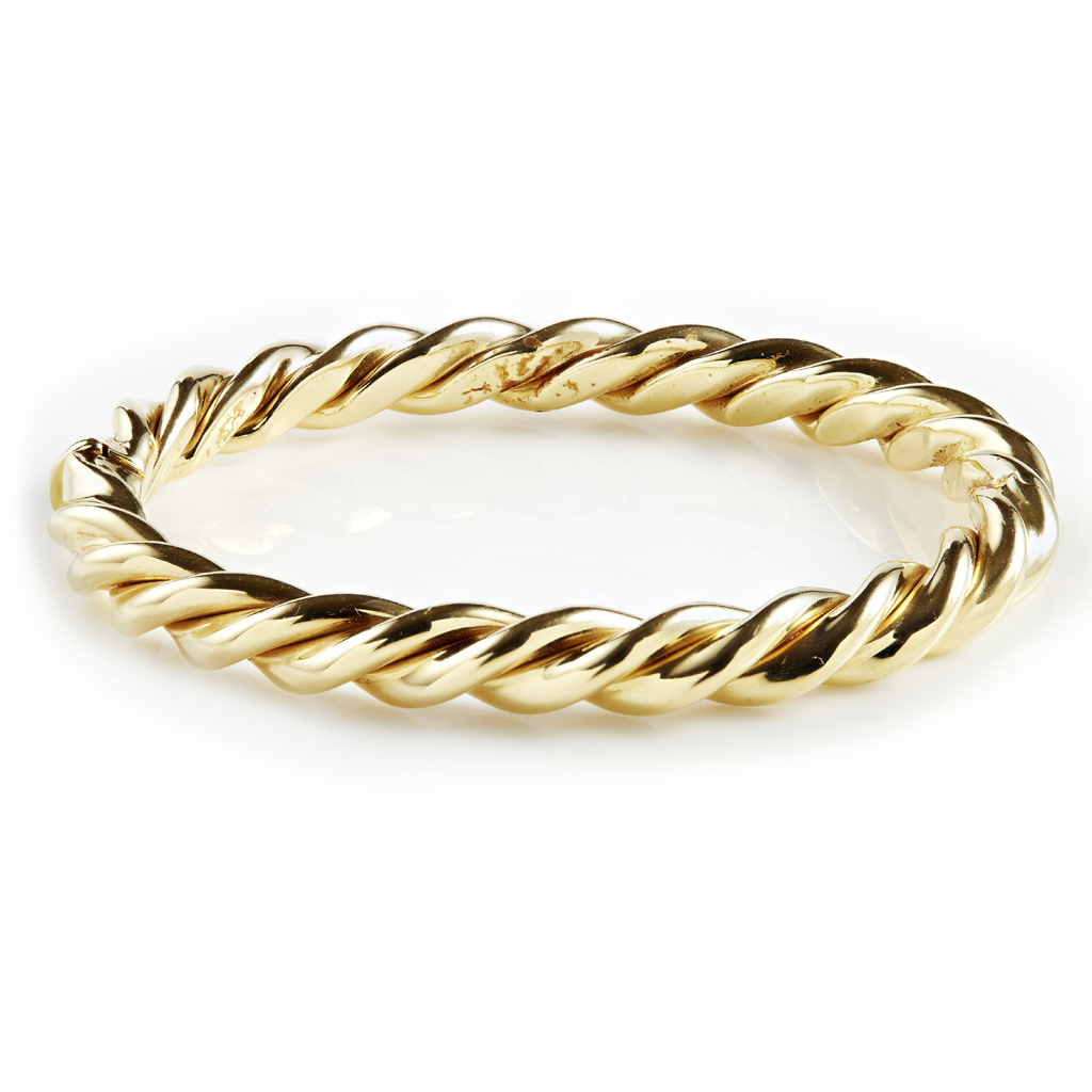 Appraisal: A modern ct gold bangle of hinged twisted design with