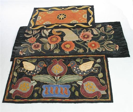 Appraisal: THREE HOOKED RUGS Floral pattern x Floarl and bird pattern