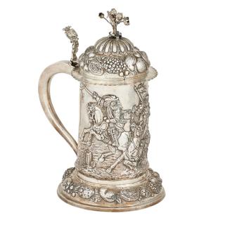 Appraisal: GERMAN SILVER REPOUSSE TANKARD Lid and foot decorated with fruits