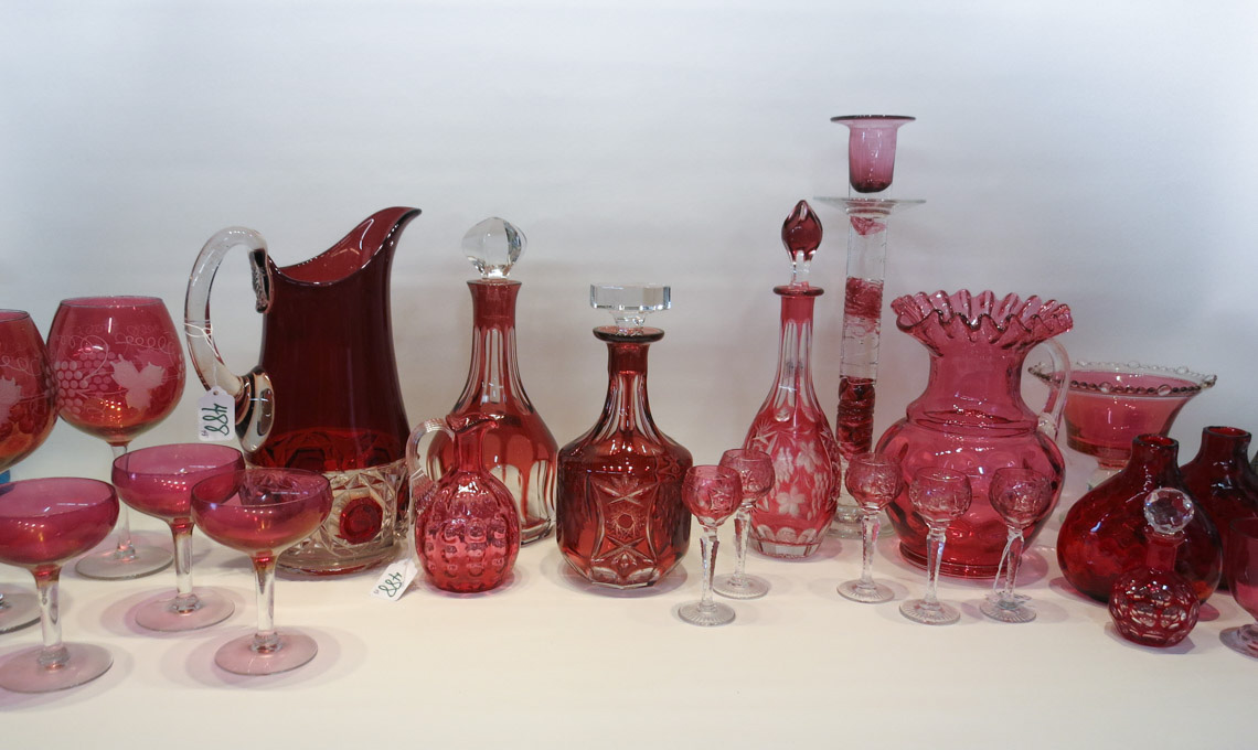 Appraisal: TWENTY-EIGHT RUBY AND CRANBERRY GLASS PIECES including pitchers decanters pair