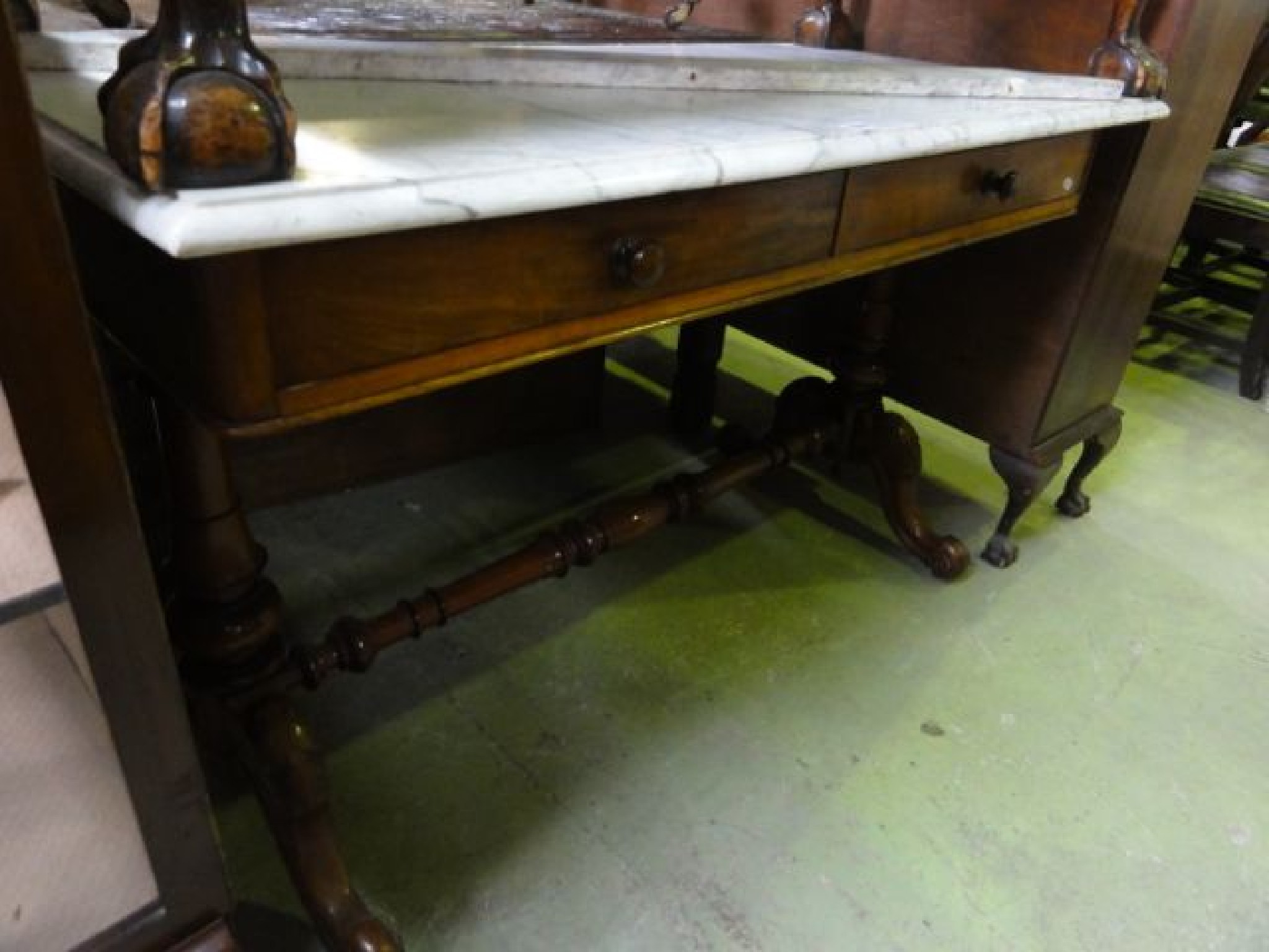 Appraisal: A Victorian mahogany washstand of rectangular form with white and