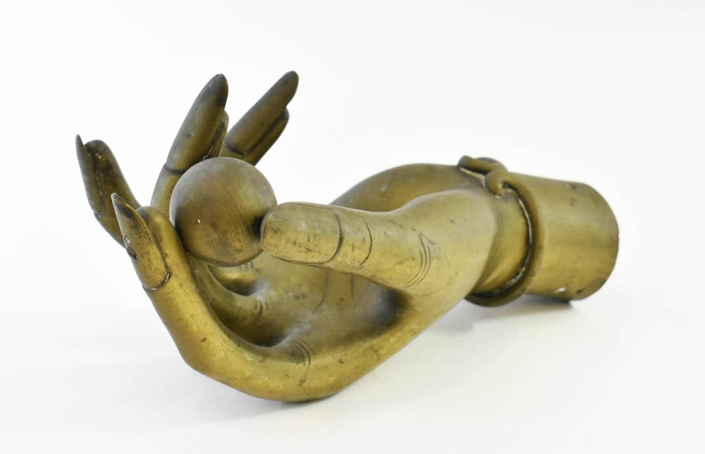 Appraisal: THREE ASIAN BRONZE AND BRASS HANDS th oth Century The