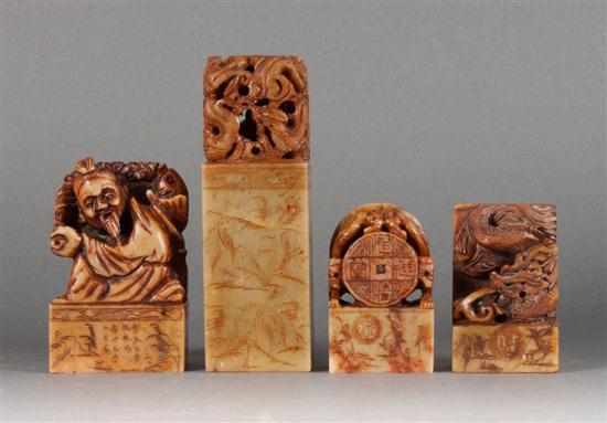 Appraisal: Four Chinese carved hardstone figural chops figures include dragon group